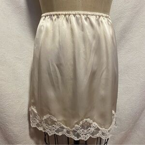 Vtg Adagio silk half slip lace trimmed.
